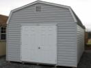 Pine Creek 12x20 HD Dutch Barn Barn with Harbor Stone walls, White trim and Black shutters, and Charcoal shingles